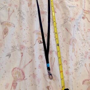 black  woven around the neck lanyard approximately 33-34 inches long